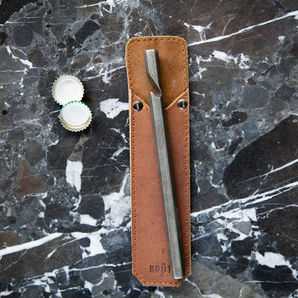 Bottle opener with leather sleeve