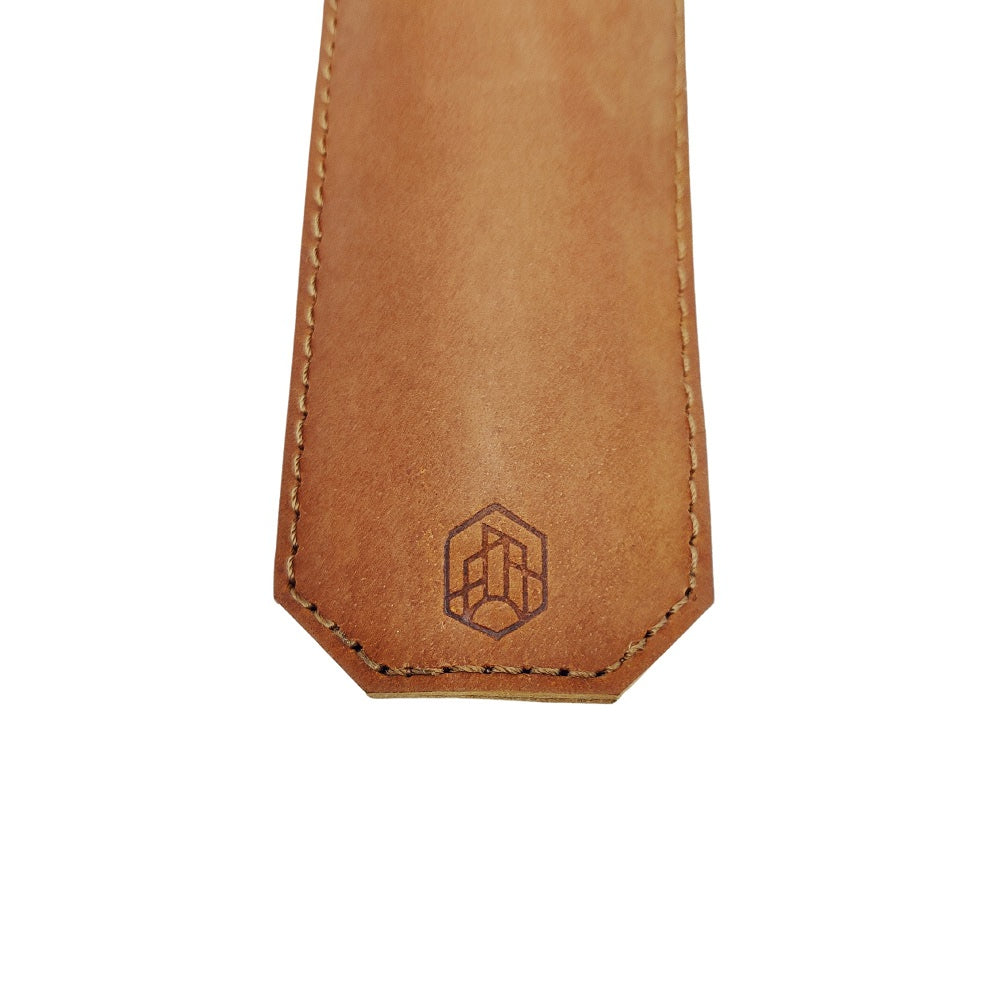 Bottle opener with leather sleeve