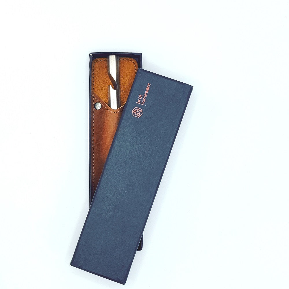 Bottle opener with leather sleeve