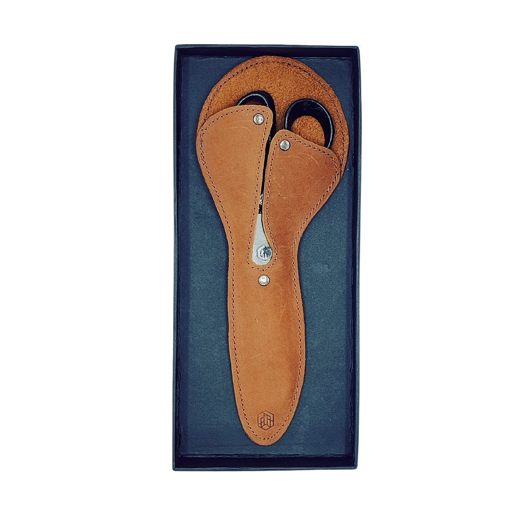 Universal scissors with leather sheath
